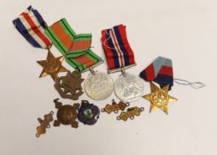Four WW2 medals- the Defence Medal, the War medal, the 1939-1945 Star and the France & Germany