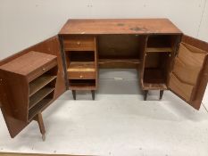 A mid century teak enclosed desk, width 106cm, depth 51cm, height 78cm