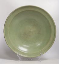 A Chinese Ming Longquan celadon dish, 15th/16th century, 43.5cm diameter