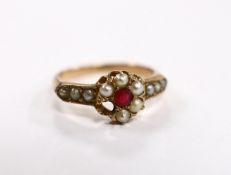 A yellow metal, red paste and split pearl cluster set ring, size O, gross weight 3 grams (one