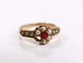A yellow metal, red paste and split pearl cluster set ring, size O, gross weight 3 grams (one