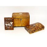A 19th century two section tortoiseshell tea caddy on ball feet, a tortoiseshell necessaire case and