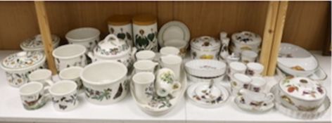 A Royal Worcester Evesham part dinner service, together with Portmeirion items including eight mugs,