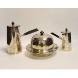 Two silver plated cafe au lait pots, one with double walled interior and a muffin dish, each with