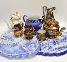 Nine ceramic items including two Dutch blue and white wall plaques, a silvered jug, a teapot, four