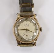 A gentleman's 9ct gold Smiths Deluxe manual wind wrist watch, with subsidiary seconds and case