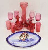 A Royal Crown Derby oval wall plate, a tortoise figure model and thirteen cranberry glass items