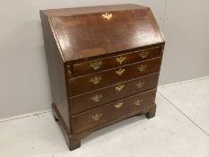 A George III oak bureau, width 91cm, depth 53cm, height 106cm