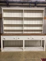 A large Victorian part painted pine potboard dresser, with boarded rack, width 244cm, depth 62cm,