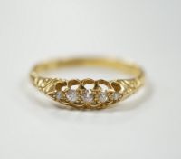 A Victorian 18ct gold and graduated five stone diamond chip set half hoop ring, size X, gross weight