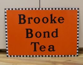 A Brooke Bond Tea enamel sign, 51cm high x 76cm wide