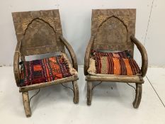 A pair of Indian metal clad low chairs with Kilim covered cushions, width 57cm, depth 48cm, height
