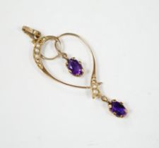 A modern Edwardian style 9ct gold, amethyst and seed pearl set drop pendant, 45mm, gross weight 1.