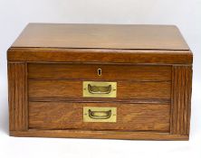 An oak cased canteen of plated cutlery, twelve place settings, 45 x 35 x 23.5cm