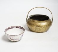 A Chinese bronze hand warmer, 11.3cm and an 18th century Chinese Canton enamel cup, cup 7cm