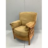 An Ercol oak armchair, width 82cm, depth 68cm, height 93cm