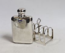 A small Edwardian silver hip flask, Chester, 1907, 10.4cm and a later silver five bar toast rack.