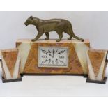 An Art Deco marble clock garniture, 1930’s with ‘panther’ mount