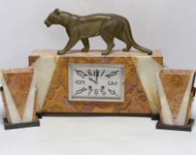 An Art Deco marble clock garniture, 1930’s with ‘panther’ mount