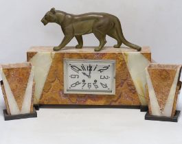 An Art Deco marble clock garniture, 1930’s with ‘panther’ mount