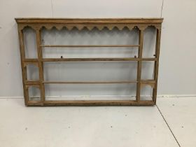 A 19th century pine plate rack, width 159cm, height 100cm