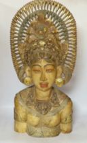 A Balinese carved wood bust of a lady, 69cm