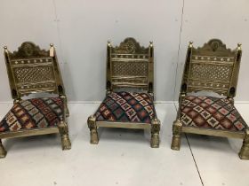 Three Indian metal clad Pidha low chairs with enamelled decoration and Kilim covered seats, width