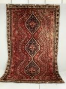 A North West Persian red ground carpet, 290 x 190cm