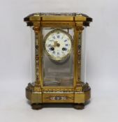 A late 19th century French gilt brass and champleve enamel cased eight day four glass mantel