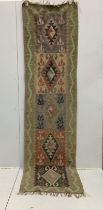 A Kilim polychrome flatweave runner, 280 x 78cm