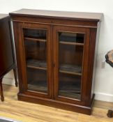 A late Victorian glazed mahogany bookcase, width 87cm, depth 29cm, height 102cm