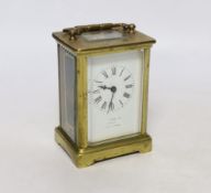 A late 19th century French eight day brass cased carriage timepiece, signed Tfink & Co. London, Made