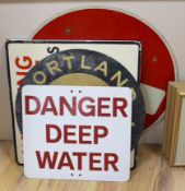 A group of enamel and other signs, including warning signs and cement advertising signs