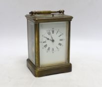 A 19th century French brass carriage clock with repeater, 17cm high