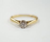 A modern 18ct gold and solitaire diamond set ring, size G/H, gross weight 1.8 grams.