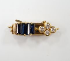 An 18ct gold, sapphire and diamond cluster set clasp, 21mm, gross weight 2.3 grams.