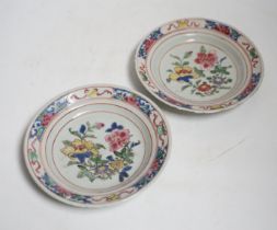 A pair of Chinese famille rose fencai small plates, early Yongzheng period,16 cms diameter, each