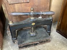 A Victorian cast iron book press, width 50cm, depth 25cm, height 42cm