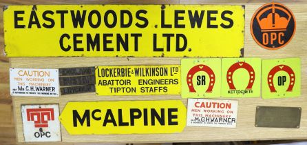 A group of enamel and other signs, including Eastwoods Lewes cement Ltd, McAlpine etc. largest