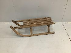 A vintage wooden sledge, length 89cm