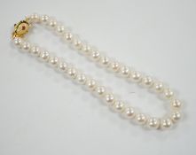 A Butler & Wilson single strand cultured pearl necklace, with enamelled and gem set bug clasp,