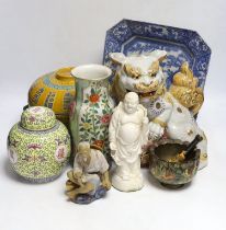 A collection of mostly Chinese ceramics, to include a vase, a lion dog, etc. blue and white dish
