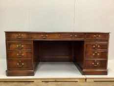 A reproduction George III style mahogany pedestal desk, width 180cm, depth 90cm, height 76cm