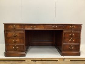 A reproduction George III style mahogany pedestal desk, width 180cm, depth 90cm, height 76cm