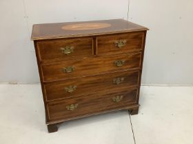 A reproduction George III style banded mahogany chest of drawers, with a later oval marquetry inlaid