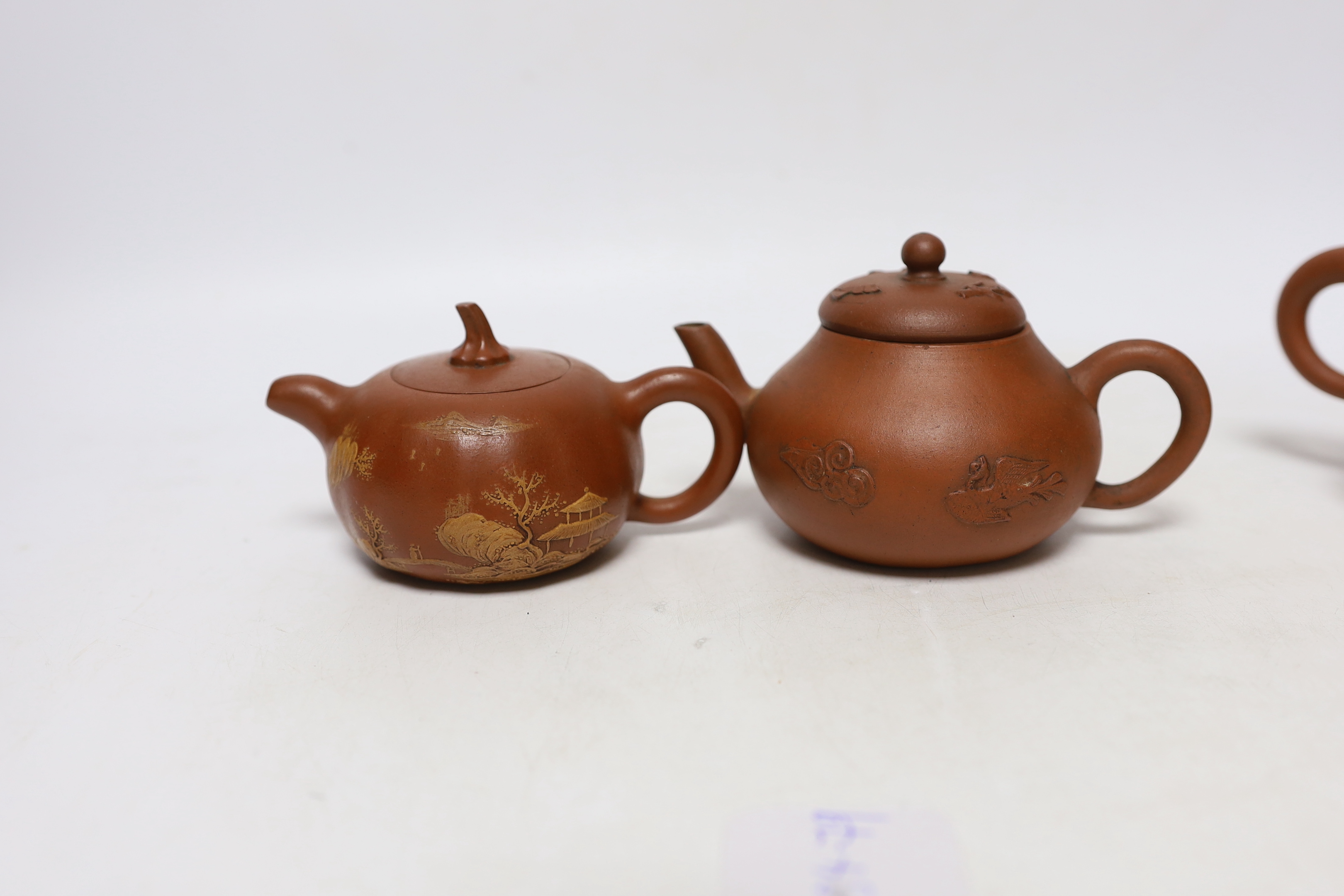 Four Chinese Yixing teapots, one slip decorated with a landscape, tallest 10.5cm Provenance- from - Image 3 of 8