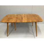 An Ercol elm and beech rectangular extending dining table, 224cm extended, width 88cm, height 71cm