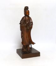 A Chinese carved boxwood figure of Guanyin, 19th century, 37cm high