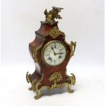 A late 19th century Louis XV style eight day red tortoiseshell and gilt metal cased mantel clock,