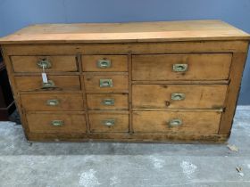 A pine counter ten drawers, width 164cm, depth 62cm, height 86cm